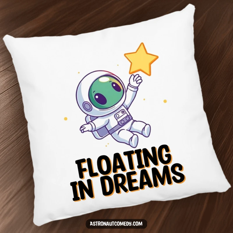 Funny pillow showing a curious alien astronaut floating joyfully in space, reaching its hand out towards a twinkling star.