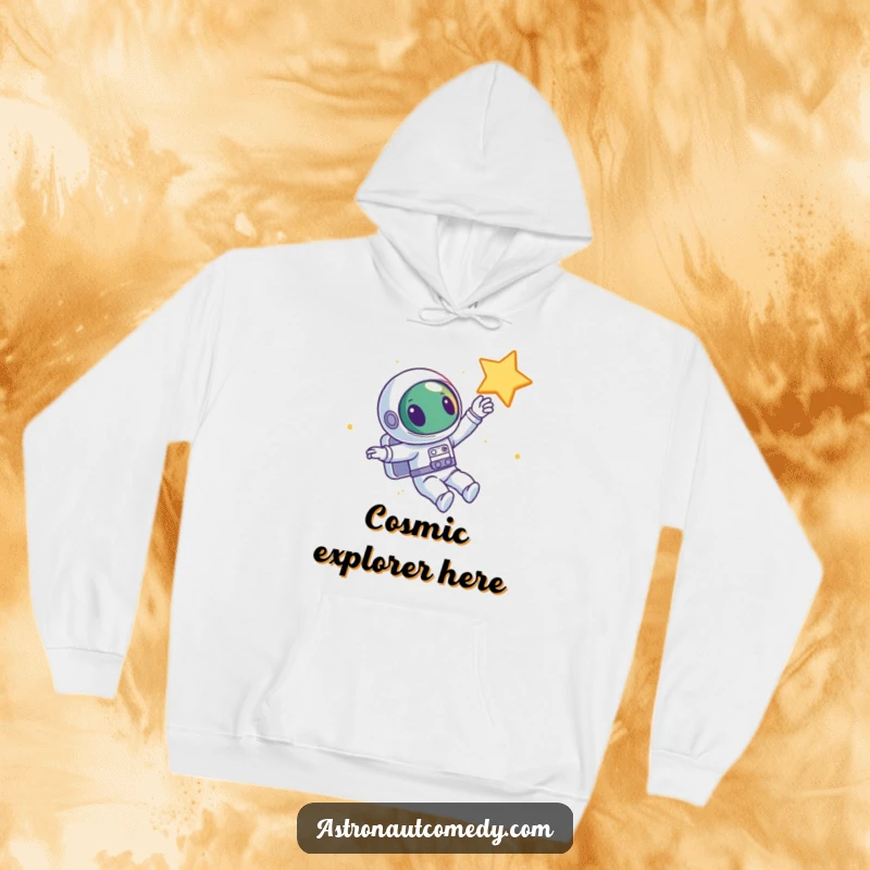 Funny hoodie showing a joyful alien astronaut floating in deep space, curiously reaching out to touch a distant, twinkling star.