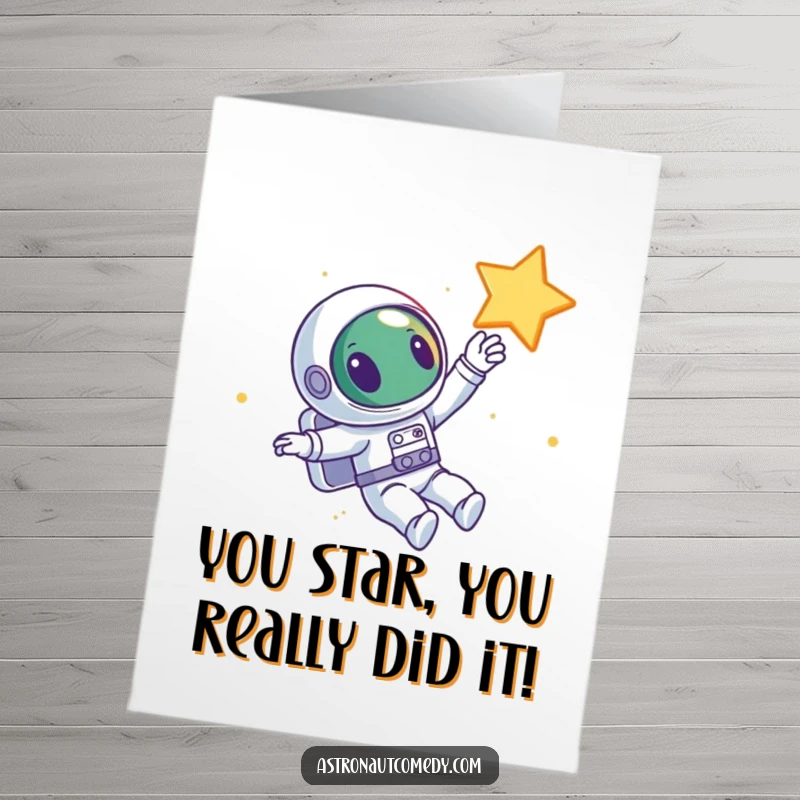 Funny Free Printable Congratulations Card: a curious alien astronaut floats joyfully in space, reaching out to touch a star.